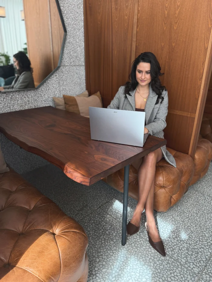 Christine in a virtual life coaching session at her laptop